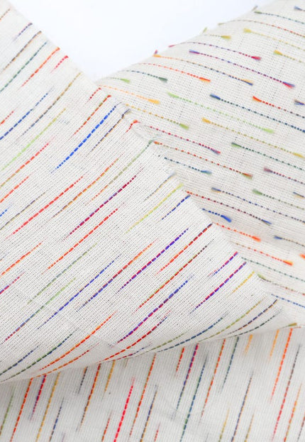 Motivos de lluvia de meteoritos multicolores sobre tela de algodón de muselina de Bengala por yarda, 45 pulgadas de ancho, 157 GSM